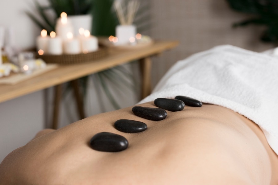 Hot stone therapy setup at Infinity Beauty & Spa Madhapur